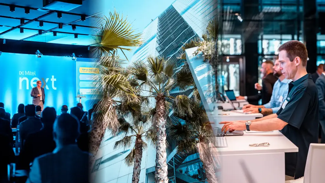Konferenzbereich der Mitel Next in Barcelona mit Palmen und Bühne